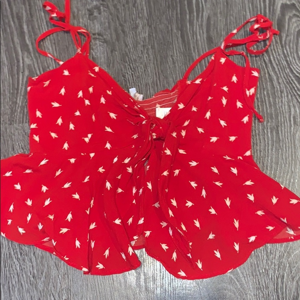 red flowy tank